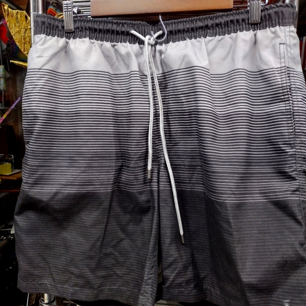 Kirkland signature large swim shorts black and gray striped.